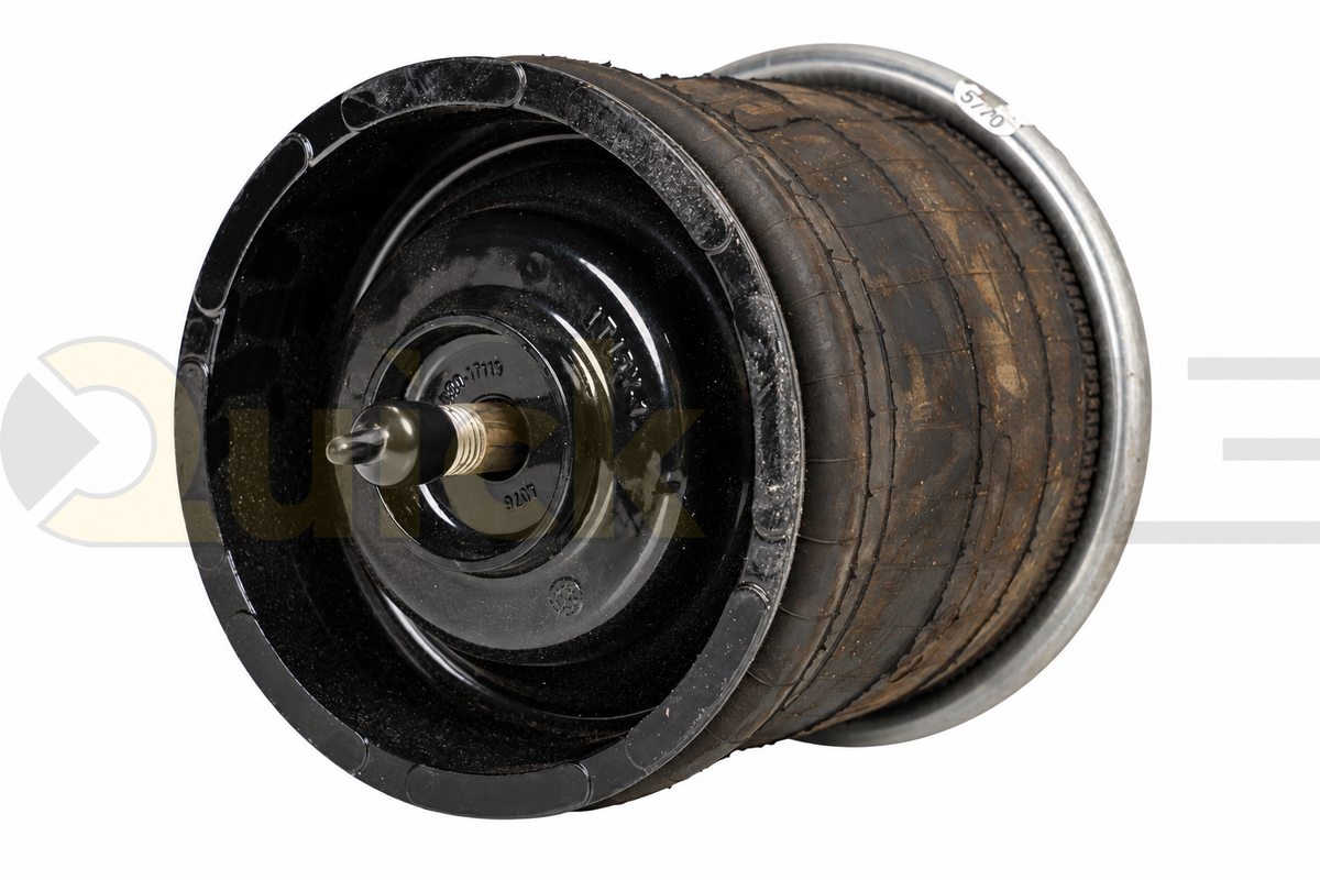 Air spring viewed at an angle, showing the flexible body, end plates, and mounting points.