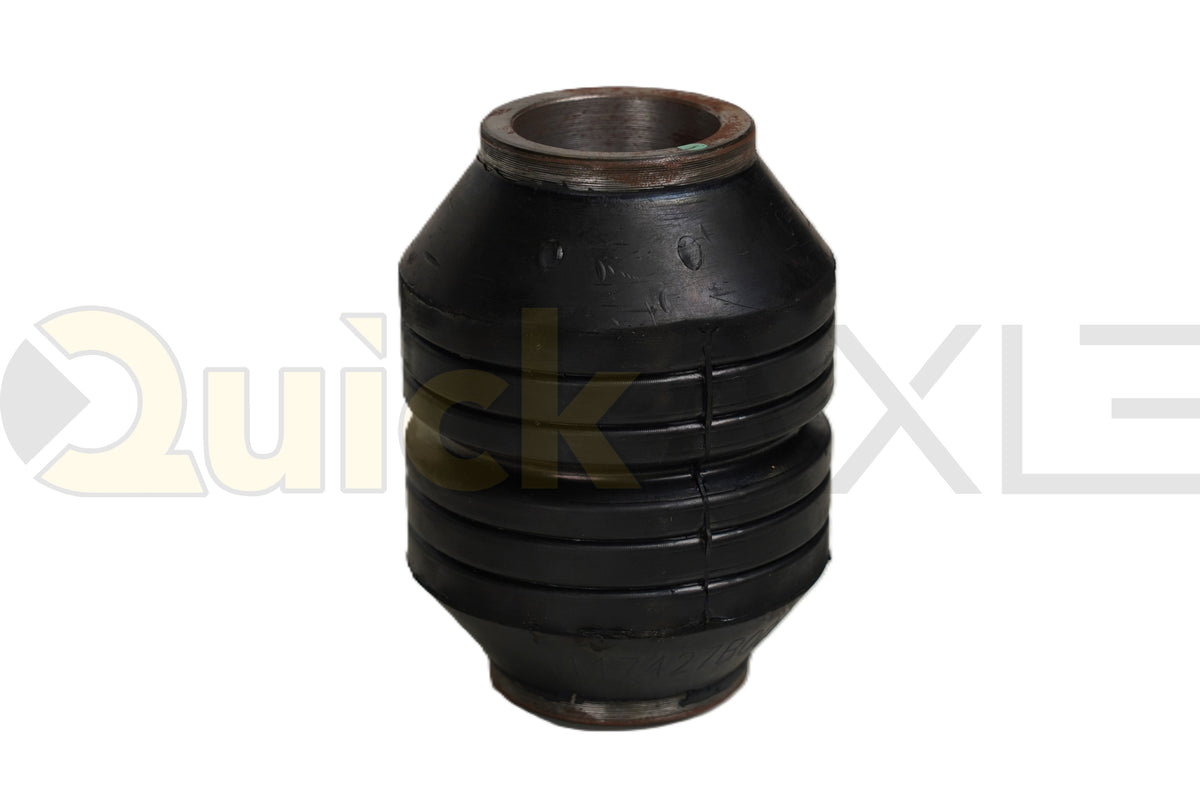 Ribbed suspension bushing with a central sleeve, angled view.