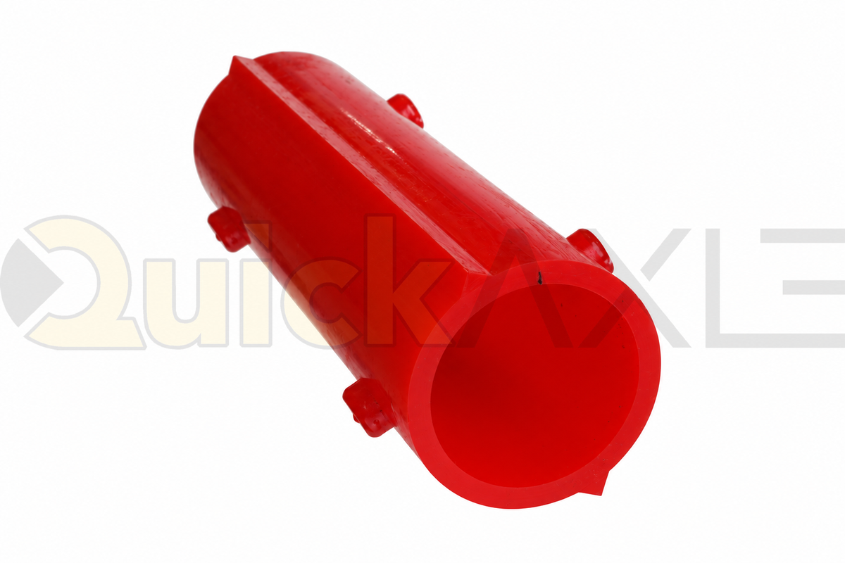 Red split suspension bushing showing its hollow center and longitudinal seam.