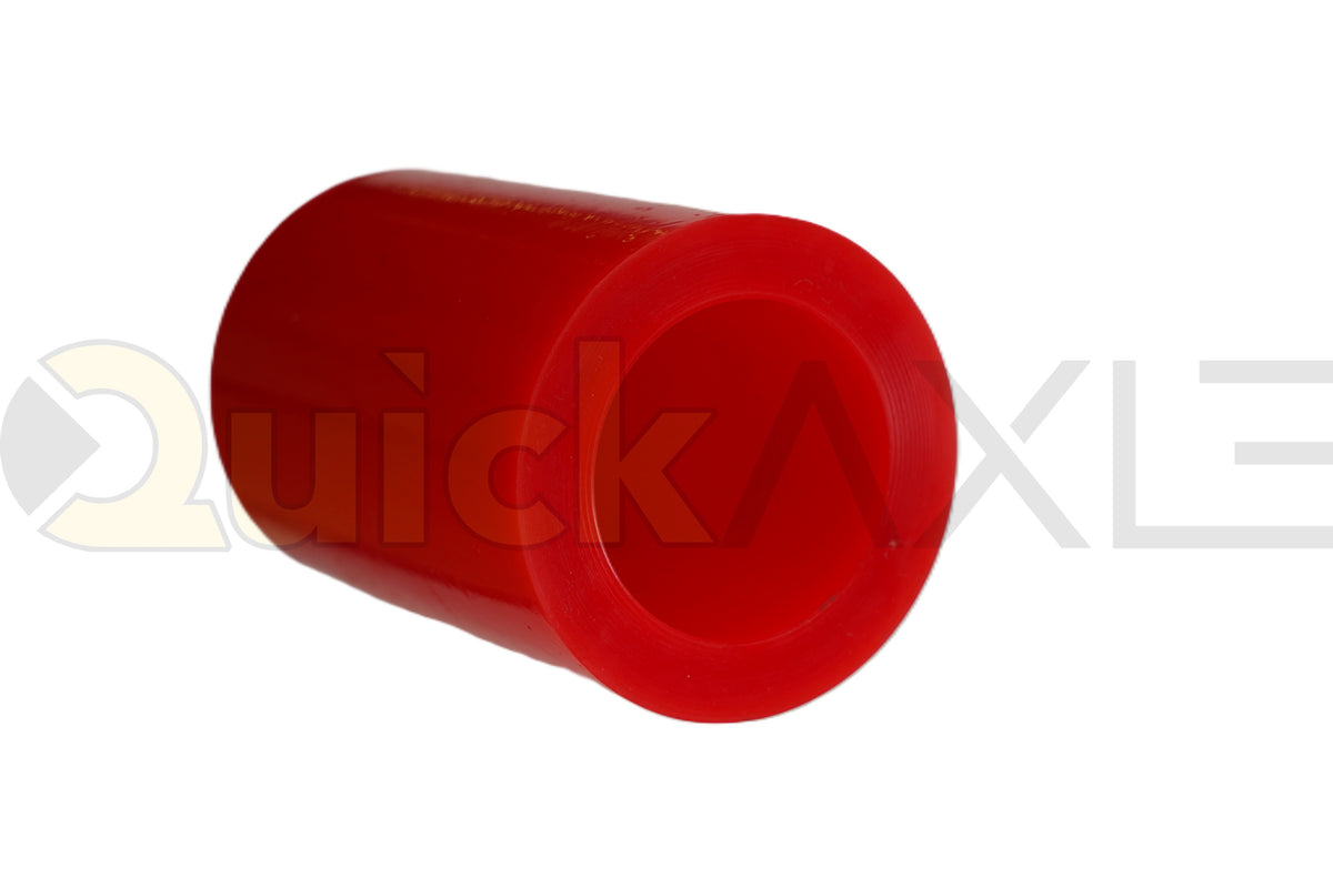 Red cylindrical suspension bushing showing its hollow center.