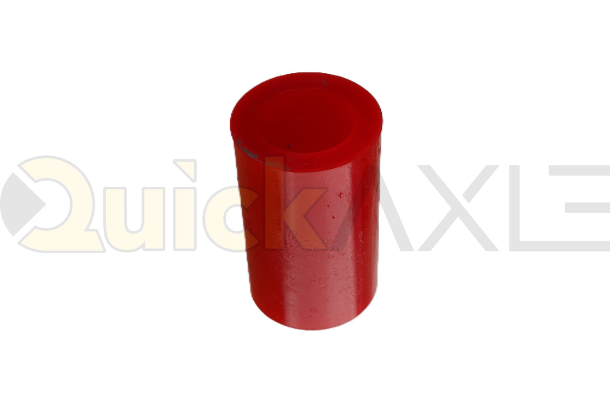 Red cylindrical suspension bushing showing its hollow center.