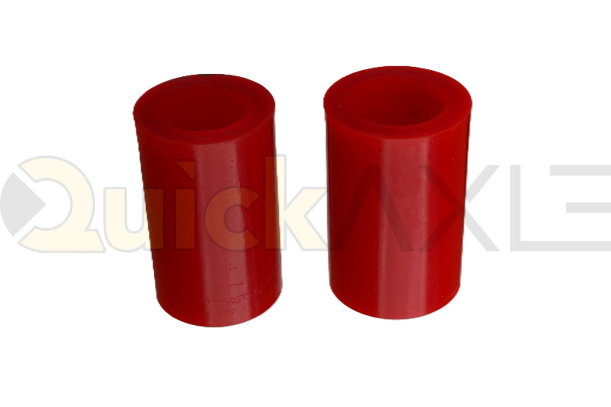 Red cylindrical suspension bushing showing its hollow center.