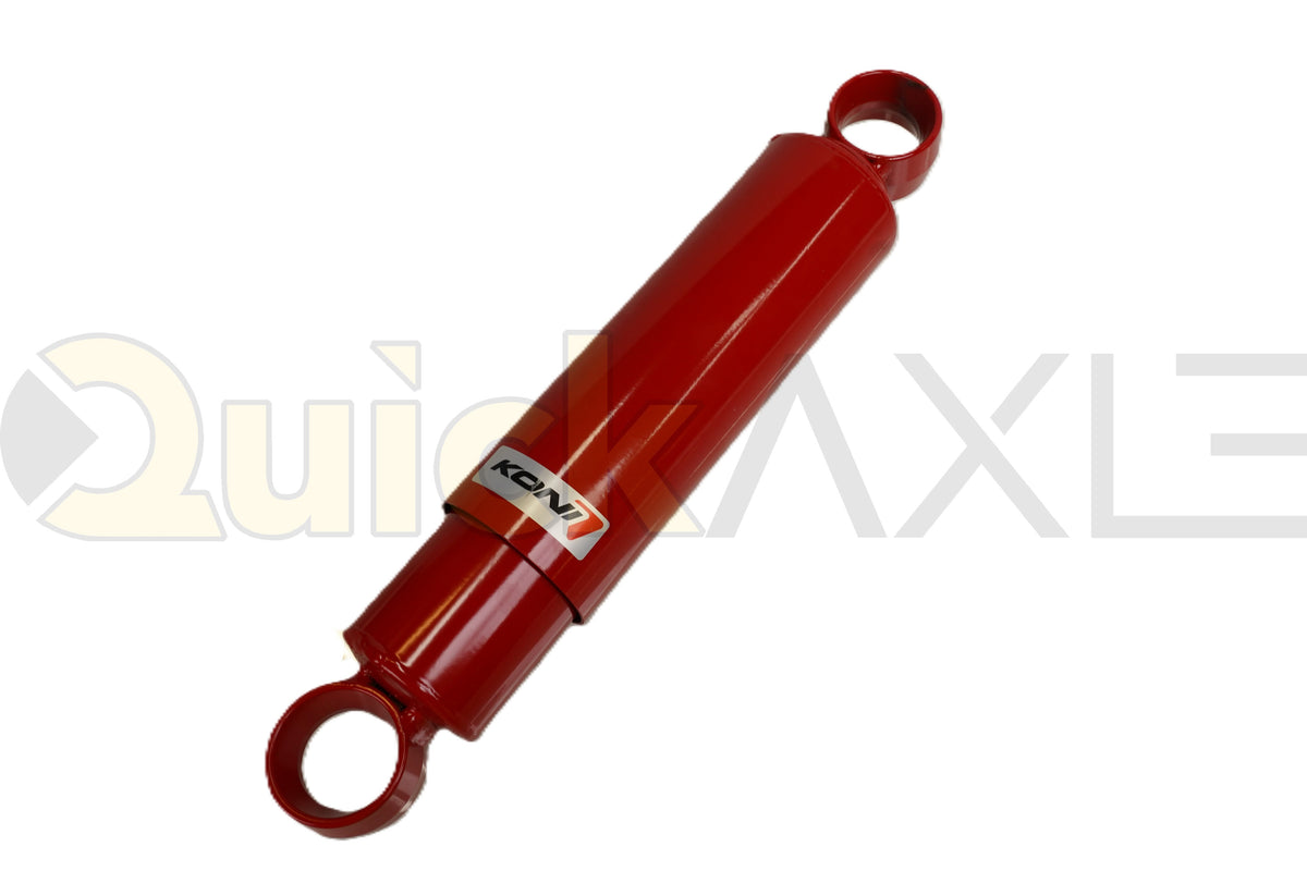 Red KONI shock absorber with mounting eyes at both ends.