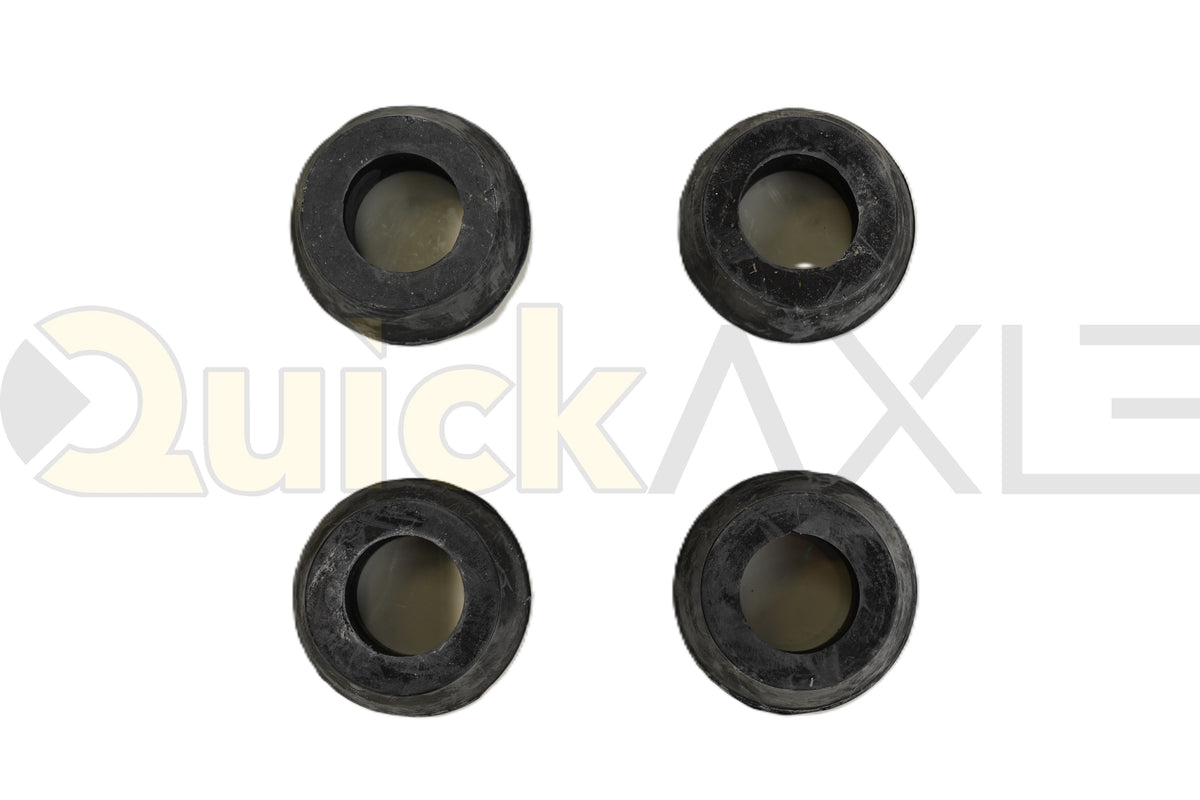 Black shock-absorber bushing with a central opening, angled view.