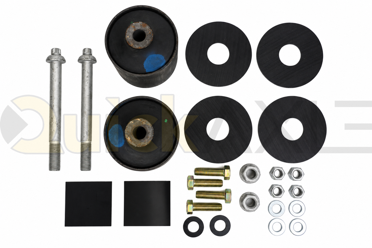 Suspension bushings, washers, bolts, nuts, and square pads arranged together.