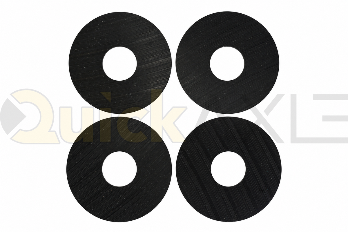 Flat black circular wear washers showing their central openings.