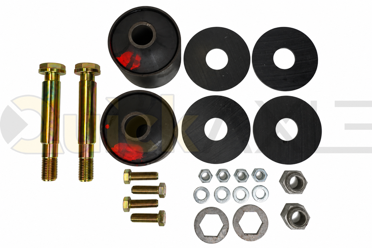 Suspension bushings, washers, bolts, and nuts arranged on a white background.